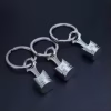 piston-04 Автомобільний міні-брелок «Поршень двигуна» металевий, сріблястий