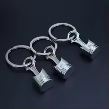 piston-04 Автомобільний міні-брелок «Поршень двигуна» металевий, сріблястий